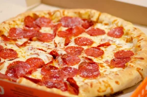 Large pepperoni pizza. Photo byAlan Hardman on Unsplash